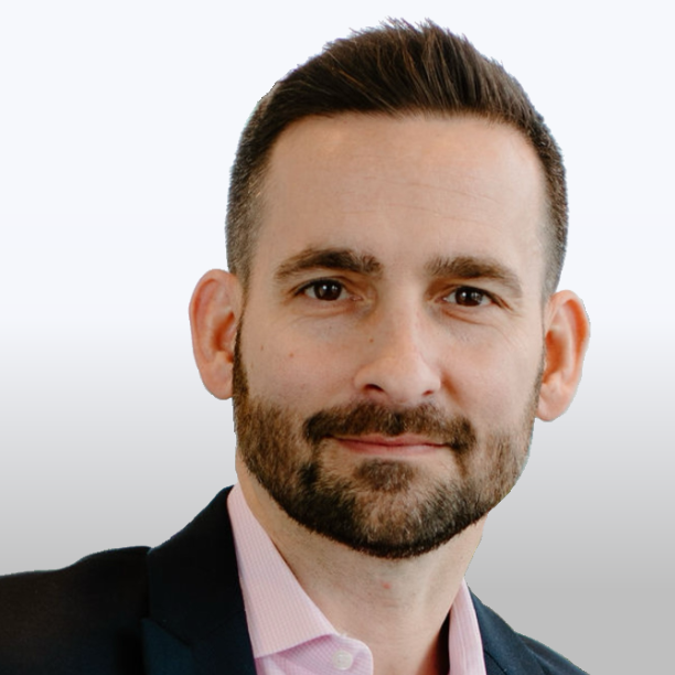 Chad Hill, Advisor of Proactive Intelligence, smiling in a professional headshot with a neutral background